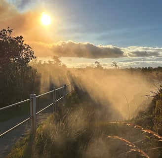 steam rising from volcano vent caught in golden hour sunlight