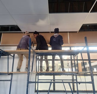 Supervising Bulkhead installation for suspended ceiling, Belair Shopping Centre
