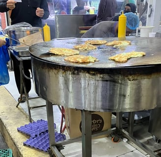 Street food eggs on a tawa