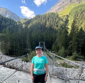 Corinne from Hidden Switzerland Travel crossing the Kander River in the Gasterntal