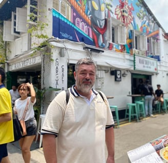 Image of Author: Jason A Ellis traveling the world, local area in Singapore