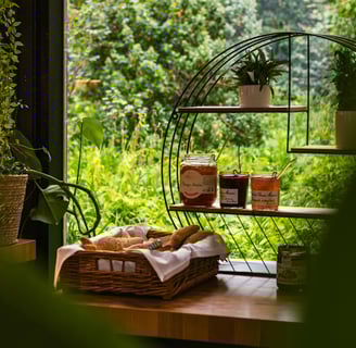 a table with a basket of food and a basket of food