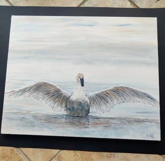 Paintings of a bird on water during winter