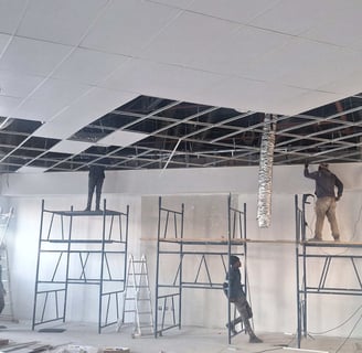 Commercial ceiling renovation – Belair Mall tenant improvements with ducting and grid ceiling