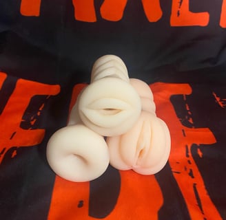 three different masturbators piled up