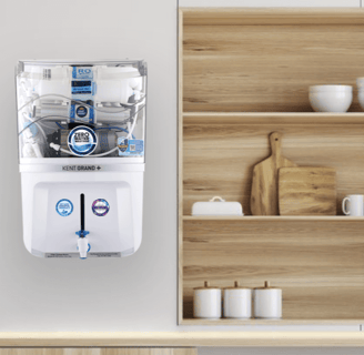 a water filtrator with a water bottle in the middle