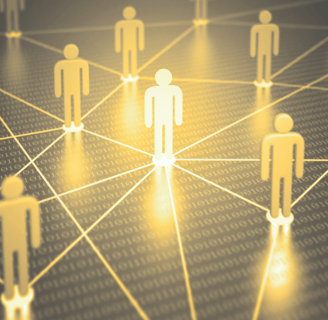 a group of people standing around a network of connected lines