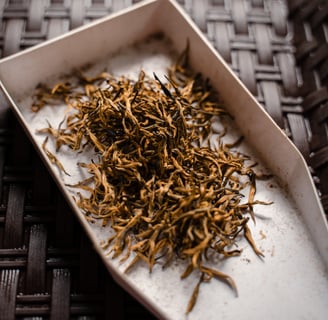a plate with a pile of dried herbs