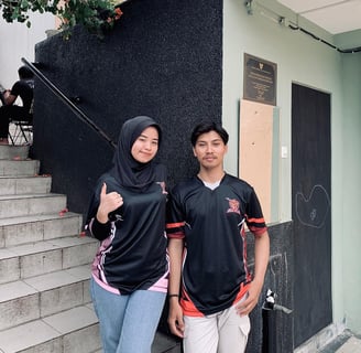 a man and woman standing next to each other