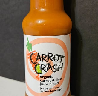 Glass bottle of Carrot Crash juice with full colour label