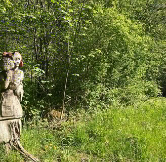 Wood carvings along the Entschlige river outside of Frutigen