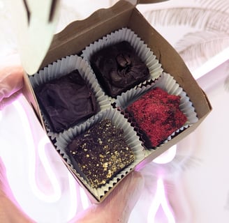 a person holding a box of chocolates