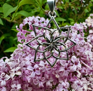 Lotus Flower Sterling Silver Necklace on Lilac Flowers