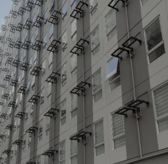 a building with a bunch of windows and a clock on it