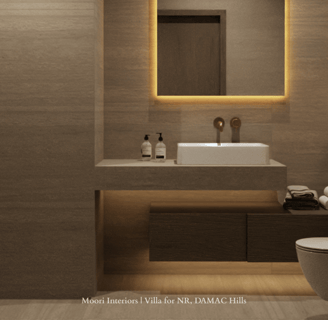 Bathroom mirror with integrated cove lighting, a white sink and dark wood vanity with underlighting