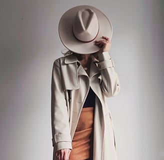 a woman in a hat on a white background