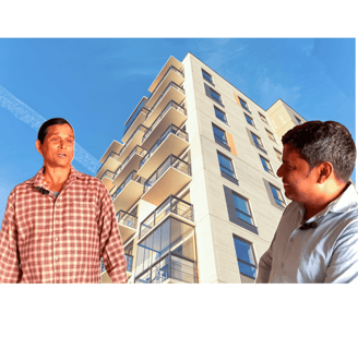 Two men discussing real estate, superimposed on a modern apartment building background.