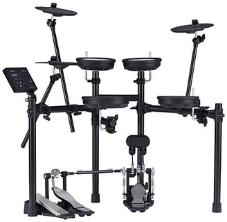 a drum kit with a laptop and a keyboard