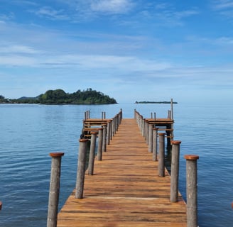 Jetty overlooking Pasumpahan island in Sungai Pisang, West Sumatra