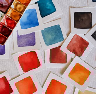 a bunch of watercolor swatches on a white background