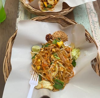 two baskets with food on a table