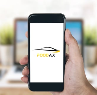 a person holding a phone with a logo on it