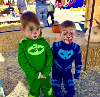 Puppy and Clown Face Painting at the Pumpkin Patch