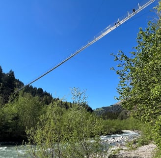 Looking up at Hangebrucke Hostalde over the Entschlige River in Frutigen Switzerland