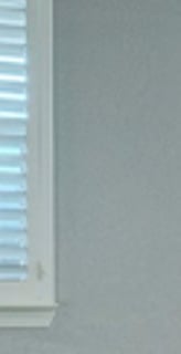 white shutters blue kitchen open space