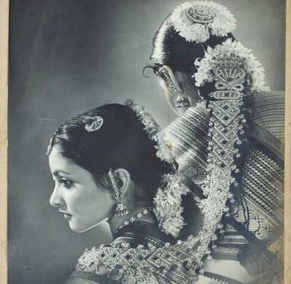 a woman in a traditional indian costume with beautiful hair