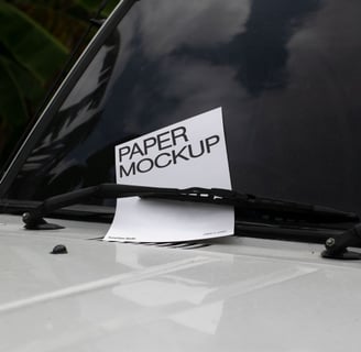 a car with a paper sign on it