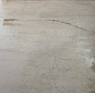 A freshly cleaned driveway included from an actual customer review. Located in Denton Texas.