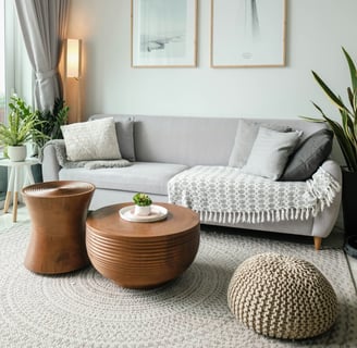 a living room with a couch and a table
