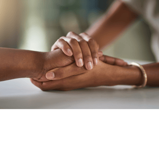 Pais de Autistas recebendo apoio. A woman holding her hands in front of a man's hands