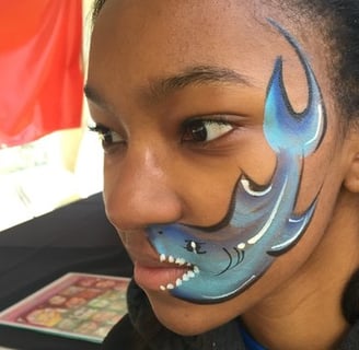 Shark Face Painting Design at a Party