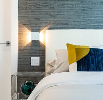 a bedroom with a bed and a door