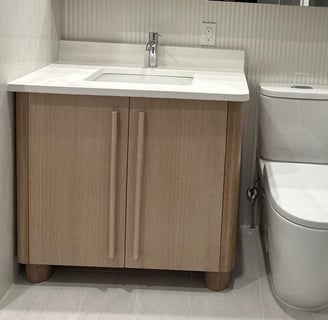 a bathroom with a toilet and a mirror