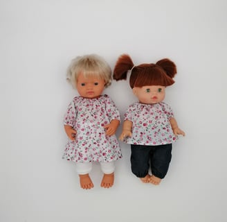 Miniland doll and Minikane doll dressed in handmade outfits