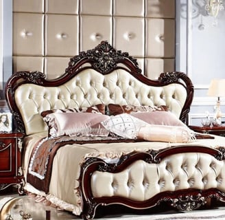 a handcarved wooden bed with a large headboard and a handcarving bed with a white bedding