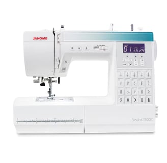 a sewing machine with a keyboard and keyboard