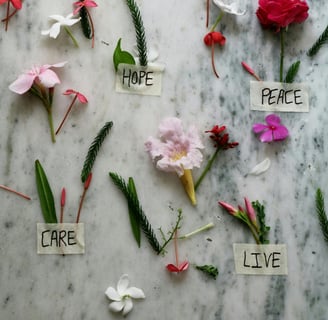 a table with flowers and words on it