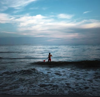 man surfing on the sea