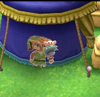 Link usando su nueva habilidad de convertirse en una pintura para llegar a nuevos lugares
