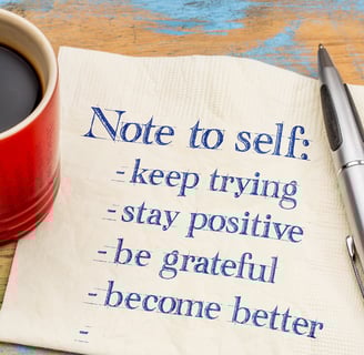 a notepad with a notepad and pen on a napkin