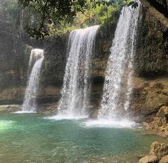 Salto Alto waterfall Bayaguana Dominican Republic with clear water and lush tropical forest