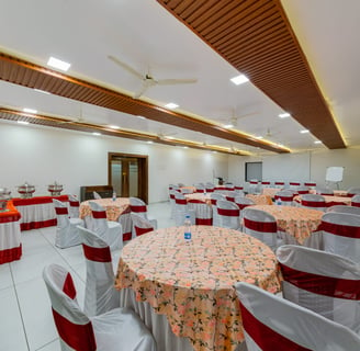 Spacious conference hall with seating arrangements 