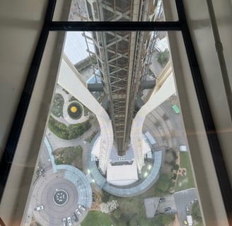 facing down through the glass floor of the space needle