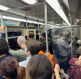 A subway car full of people