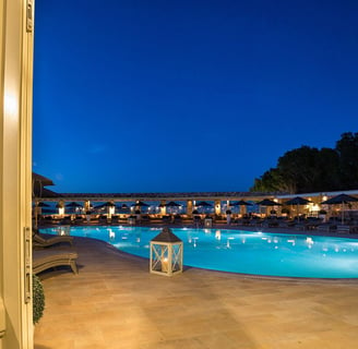 a pool with a view of the pool and the ocean Saint Andrea Seaside Resort Paros