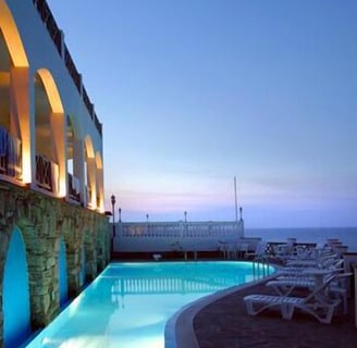 a pool with a view of the ocean